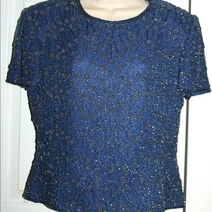 Adrianna Papell women's blue top and skirt set.